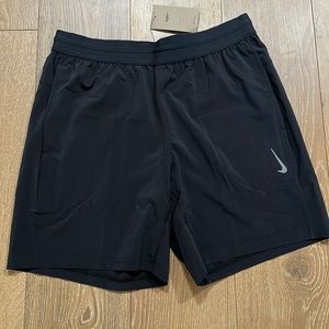 Brand new with tags, black Nike Dri-FIT yoga shorts.  Size Large.